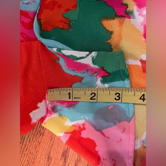 NWOT Floral Flutter Sleeve Romper. Size Small. - Picture 7 of 9